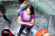 At the university/college - Students rushing up and down a busy At the university/college - Students rushing up and down a busy
