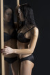 sexy woman next to mirror