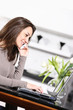 young woman working on her laptop