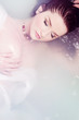 Woman relaxing in water