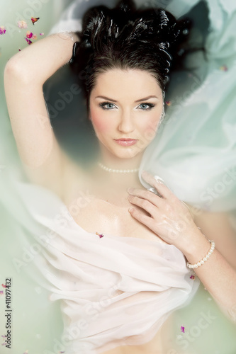 Photo: Beautiful woman in water Beautiful woman in water