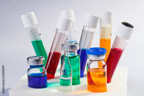 Photo: Many multicolor test tubes and bottles medical still life Many multicolor test tubes and bottles medical still life