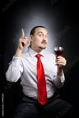 Photo: Man with glass of wine Man with glass of wine