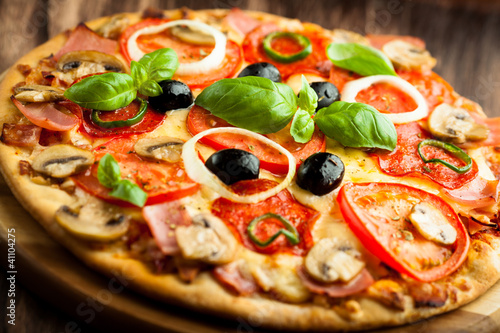 Photo: Pizza with Mushrooms, Salami and Chili Pepper Pizza with Mushrooms, Salami and Chili Pepper
