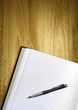 pen and notepad on desk