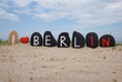 I love Berlin, stones composition on the sand