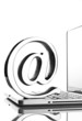 At symbol with laptop