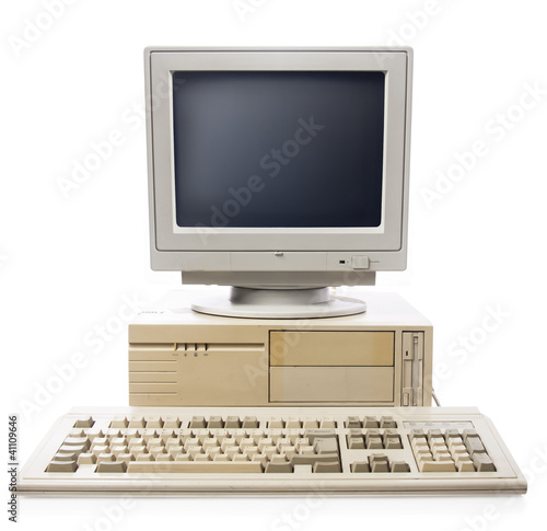 Photo: Old computer, keyboard CPU and monitor isolated on white Old computer, keyboard CPU and monitor isolated on white
