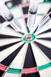 Syringes stuck in a dartboard