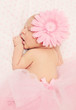 Adorable sleeping newborn baby girl