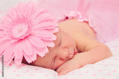 Photo: Adorable sleeping newborn baby girl Adorable sleeping newborn baby girl