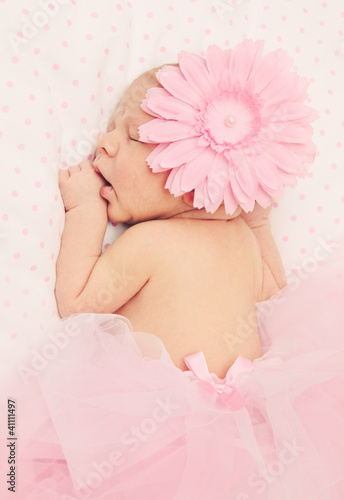 Photo: Adorable sleeping newborn baby girl Adorable sleeping newborn baby girl