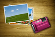 pink camera with photos