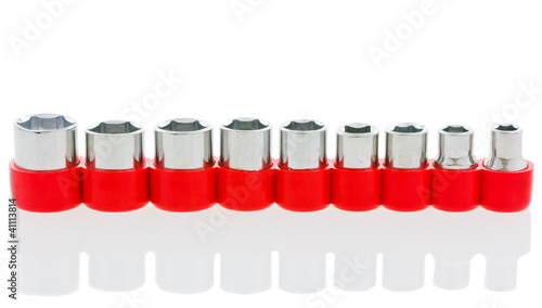 Photo: Set of metallic tools on white background with reflection. Set of metallic tools on white background with reflection.