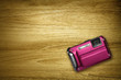 pink camera on desk