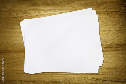 Photo: blank paper on desk blank paper on desk
