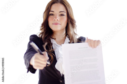 Photo: Cute business woman requesting a signature Cute business woman requesting a signature