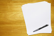 paper and pen on desk