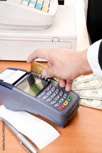 Photo: Close up Payment machine on during using Credit card Close up Payment machine on during using Credit card
