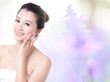 skincare girl smile and hand touch face
