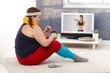 Photo: Fat woman eating chocolate cake in sportswear Fat woman eating chocolate cake in sportswear