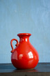 red  jug and windows reflections