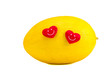 isolated yellow melon with two red hearts