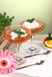 fruit jelly in glasses and fruits on table in cafe fruit jelly in glasses and fruits on table in cafe