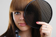Female face half-covered with the light modifier