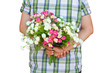 Romantic man giving flowers to his girlfriend Romantic man giving flowers to his girlfriend