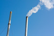 heating boiler chimney smoky in blue sky background
