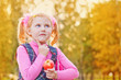 scoolgirl with apple outdoor scoolgirl with apple outdoor