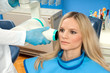 Foto: patient taking dental x-ray patient taking dental x-ray