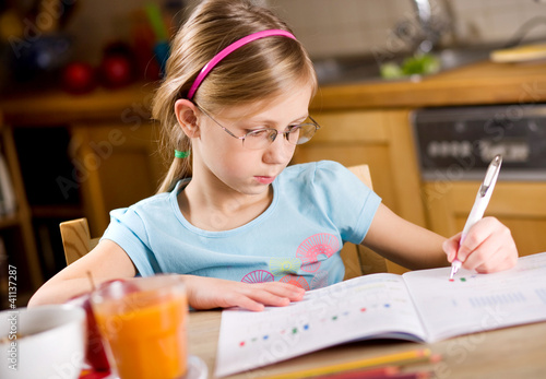 Photo: girl doing homework girl doing homework