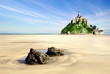 Mont Saint Michel with boulders in the foreground. Mont Saint Michel with boulders in the foreground.
