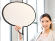 smiling businesswoman with blank text bubble