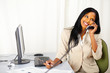 Happy executive talking on phone