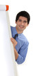 businessman standing behind a white board