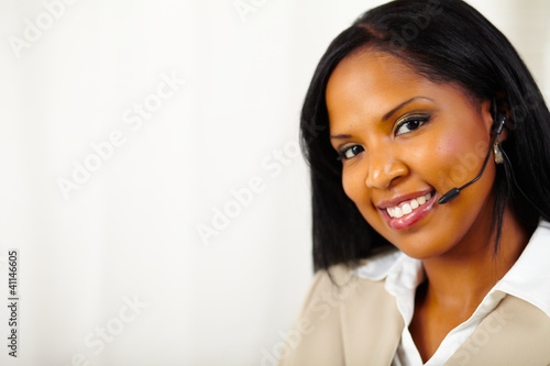 Photo: Isolated close up secretary at work Isolated close up secretary at work