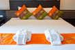 Hotel room with bed and wooden