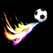 Soccer ball with colorful glowing tail on a black background.