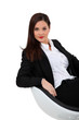 elegant businesswoman sitting in a chair