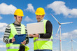 Two Engineers in a Wind Turbine Power Station Two Engineers in a Wind Turbine Power Station