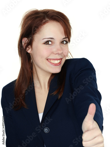 Photo: Happy woman shows thumb up. Isolated over white background Happy woman shows thumb up. Isolated over white background