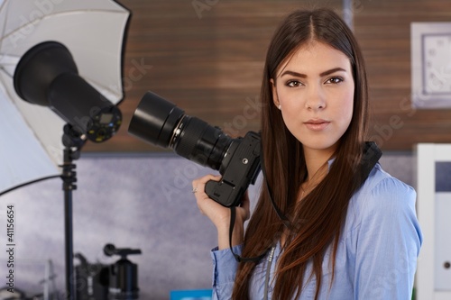Photo: Portrait of attractive photographer Portrait of attractive photographer