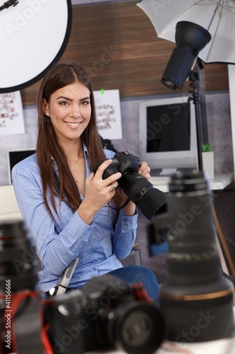 Photo: Beautiful photographer with camera Beautiful photographer with camera