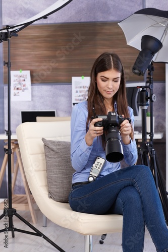 Photo: Pretty photographer woman with camera Pretty photographer woman with camera