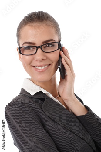 Photo: Happy businesswoman on phone call Happy businesswoman on phone call