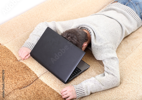 Photo: teenager sleeping with notebook teenager sleeping with notebook