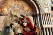 Venetian masks with San Marco church in background